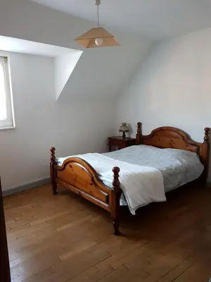 Un ou plusieurs lits dans un hébergement de l'établissement Grand appartement centre ville