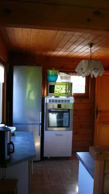 Cuisine ou kitchenette dans l'établissement Chalet de la Roche Gauthier