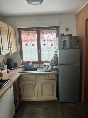 Cuisine ou kitchenette dans l'établissement Appartement de charme 3 pièces