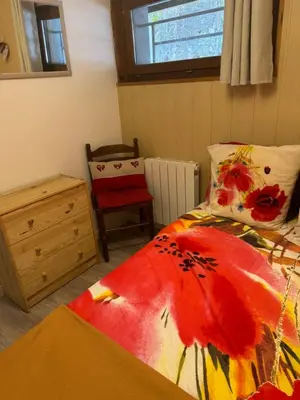 Un ou plusieurs lits dans un hébergement de l'établissement Appartement de charme 3 pièces