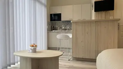 Télévision ou salle de divertissement dans l'établissement Au Petit Bonheur - Studio - Centre ville
