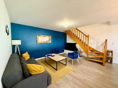 Télévision ou salle de divertissement dans l'établissement L'Appart des Copains, beau duplex & centre-ville