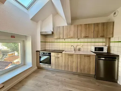 Cuisine ou kitchenette dans l'établissement L'Appart des Copains, beau duplex & centre-ville