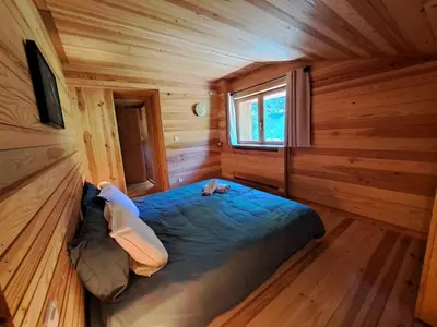 Un ou plusieurs lits dans un hébergement de l'établissement Chalet Le Belvédère, vue exceptionnelle dans les Hautes Vosges