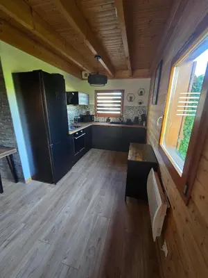 Cuisine ou kitchenette dans l'établissement Le Chalet d'AxEllie Spa et Confort