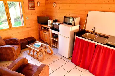 Cuisine ou kitchenette dans l'établissement Le Refuge
