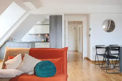 Coin salon dans l'établissement LE DUPLEX BORDERLINE , balade au bord du Rhin