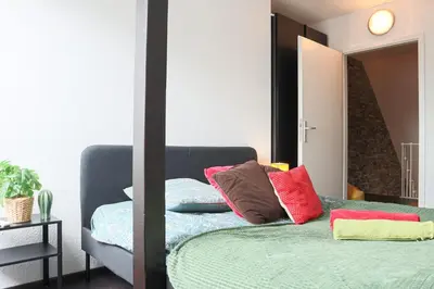Un ou plusieurs lits dans un hébergement de l'établissement LE DUPLEX BORDERLINE , balade au bord du Rhin