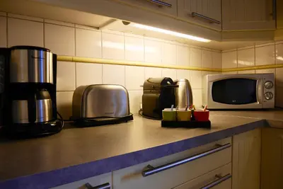 Cuisine ou kitchenette dans l'établissement Gîte Grand'Rue 