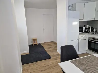 Cuisine ou kitchenette dans l'établissement Appartement rénové Au Rain Grébatte avec terrasse