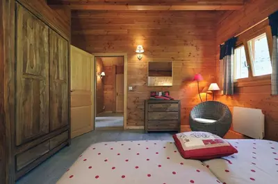 Un ou plusieurs lits dans un hébergement de l'établissement Chalet le Boulonnais, 10p avec sauna et balnéo