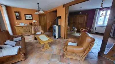 Coin salon dans l'établissement Gîte des Pinsons