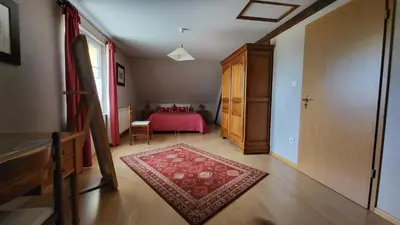 Un ou plusieurs lits dans un hébergement de l'établissement Gîte des Pinsons