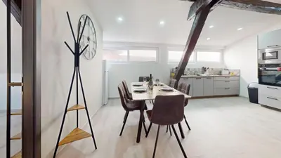 Télévision ou salle de divertissement dans l'établissement Le Big Bag 5 chambres appartement familial