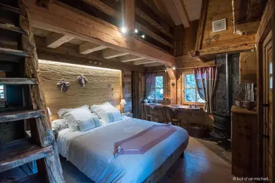 Un ou plusieurs lits dans un hébergement de l'établissement Amour de Chalet - Clairière aux cabanes - Bol d'air