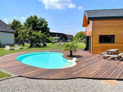Piscine de l'établissement Chez Seb et Lilou - Chalet Tiny House - piscine partagée - parking - proche Mulhouse ou située à proximité