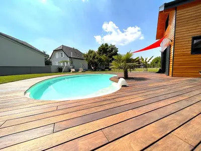 Piscine de l'établissement Chez Seb et Lilou - Chalet Tiny House - piscine partagée - parking - proche Mulhouse ou située à proximité