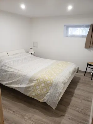 Un ou plusieurs lits dans un hébergement de l'établissement Chambres d'hôtes en Alsace