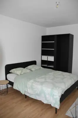 Un ou plusieurs lits dans un hébergement de l'établissement Renovated cottages