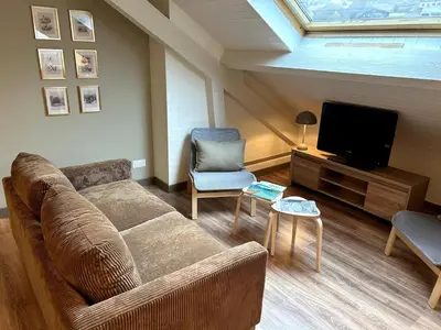 Coin salon dans l'établissement La Petite Mansarde