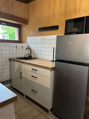 Cuisine ou kitchenette dans l'établissement Charmante maison de campagne vue sur les montagnes