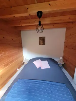 Un ou plusieurs lits dans un hébergement de l'établissement Chalet Chez Marius