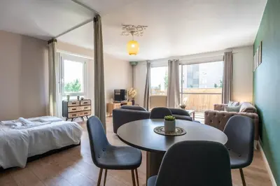 Un ou plusieurs lits dans un hébergement de l'établissement Studio Élégant sur Boulevard Mulhouse Centre