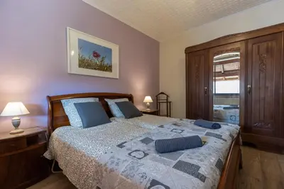 Un ou plusieurs lits dans un hébergement de l'établissement Appartement Denise - base idéale pour explorer l'Alsace, emplacement privilégié entre vignes et Vosges