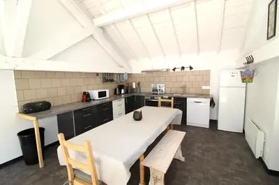 Cuisine ou kitchenette dans l'établissement Gîte Le Hangar 67 à Saulxures-sur-Moselotte - Location atypique proche lac