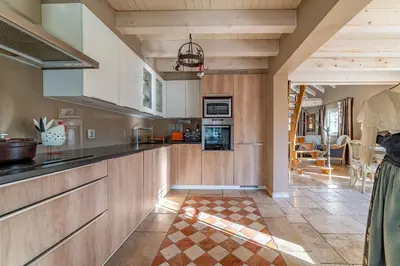 Cuisine ou kitchenette dans l'établissement Le B Cottage & SPA Privé