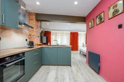 Cuisine ou kitchenette dans l'établissement Le 16-Appart'Hôtel-GregIMMO