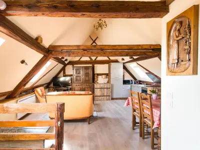 Coin salon dans l'établissement Gîtes Strengbach