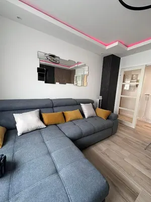 Coin salon dans l'établissement Très bel appartement PremiumSteinbach-parking