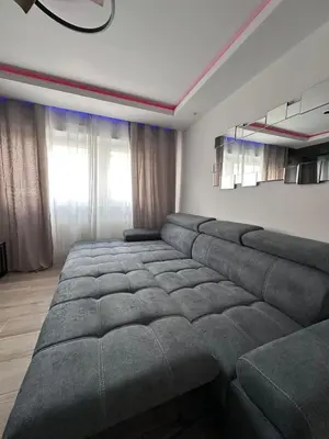 Coin salon dans l'établissement Très bel appartement PremiumSteinbach-parking