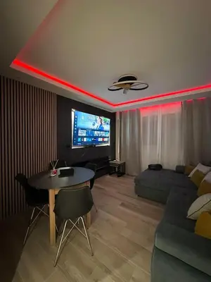 Télévision ou salle de divertissement dans l'établissement Très bel appartement PremiumSteinbach-parking