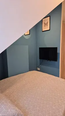 Un ou plusieurs lits dans un hébergement de l'établissement Logement Neuf Cosy avec Espaces Communs Premium 24