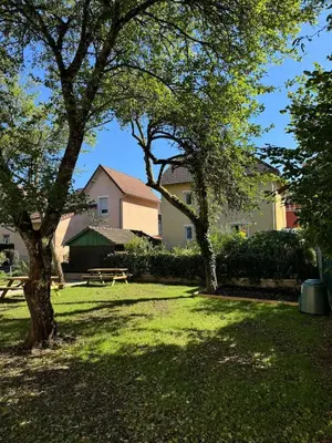 Jardin de l'établissement Logement Neuf Cosy avec Espaces Communs Premium 22