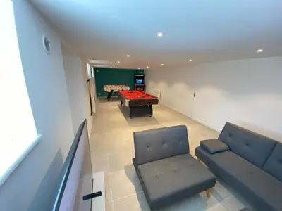 Coin salon dans l'établissement Logement Neuf Cosy avec Espaces Communs Premium 21