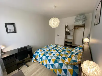Un ou plusieurs lits dans un hébergement de l'établissement Logement Neuf Cosy avec Espaces Communs Premium 11