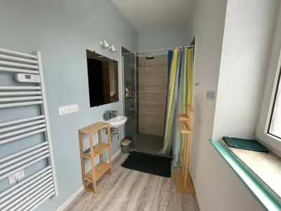 Télévision ou salle de divertissement dans l'établissement Cramiland - Apparts juxtaposés 01 & 02 - Ohnenheim