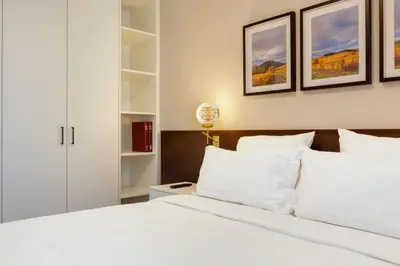 Un ou plusieurs lits dans un hébergement de l'établissement Les Appartements Husseren Collections - Proche Colmar - Eguisheim