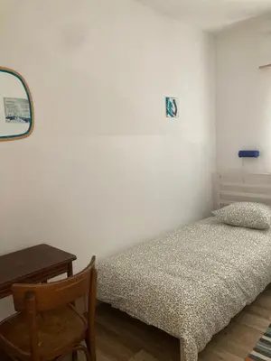 Un ou plusieurs lits dans un hébergement de l'établissement Maison Martin de ville de style 6 pers calme terrasse