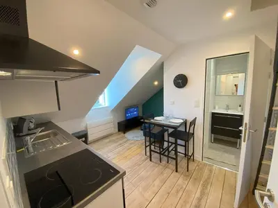 Cuisine ou kitchenette dans l'établissement 4 logements Neuf Cosy avec Espaces Communs Premium