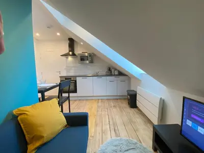 Télévision ou salle de divertissement dans l'établissement 2 logements Neuf Cosy avec Espaces Communs Premium Espace détente 23-24