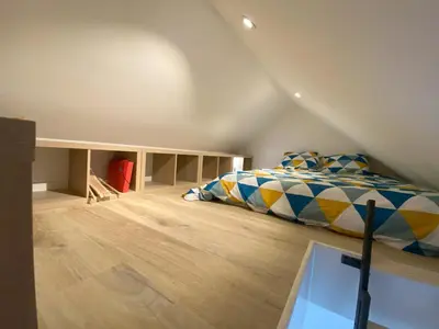 Un ou plusieurs lits dans un hébergement de l'établissement 2 logements Neuf Cosy avec Espaces Communs Premium Espace détente 21-22