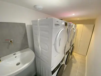 Salle de bains dans l'établissement 2 logements Neuf Cosy avec Espaces Communs Premium Espace détente 21-22