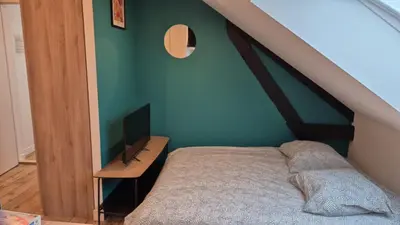 Un ou plusieurs lits dans un hébergement de l'établissement 2 logements Neuf Cosy avec Espaces Communs Premium Espace détente 21-22