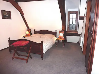 Un ou plusieurs lits dans un hébergement de l'établissement Adrihof , B&B à la Cour de l'abbaye d'Autrey