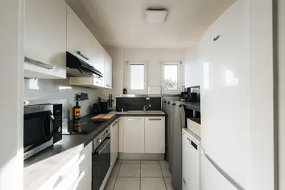 Cuisine ou kitchenette dans l'établissement Le Cerf