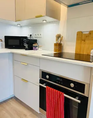 Cuisine ou kitchenette dans l'établissement A 50 mètres de la frontière de Bâle,bus-tram, avec parking